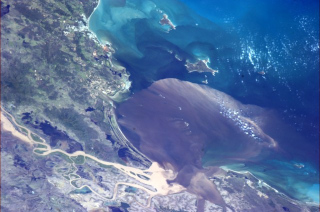 "Floodwaters pour into the Coral Sea near Rockhampton, Australia on Tuesday morning." - Chris Hadfield