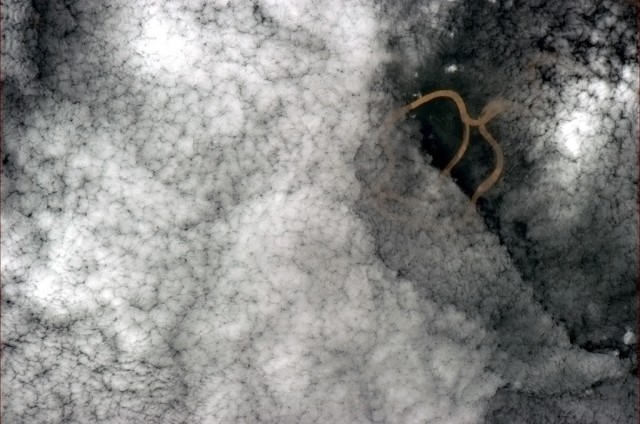 "Cauliflower clouds over the Amazon rainforest. A river like lightning." - Chris Hadfield