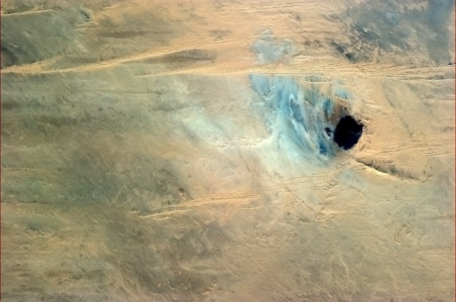 "Is this African lake real, or a mirage? Either way, a sere and beautiful natural work of art."- Chris Hadfield